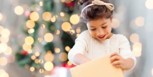 autism-resources-child-opening-christmas-present
